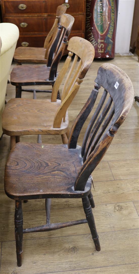 Six slat-back kitchen chairs